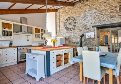 The large farmhouse kitchen is the heart of the house. It also has a log burner